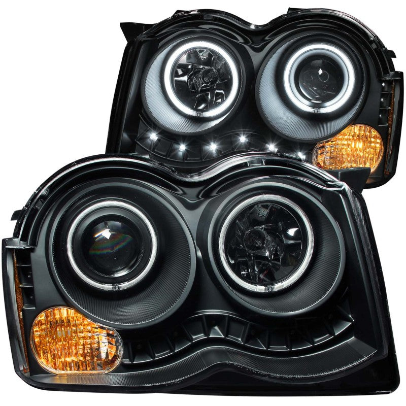 Load image into Gallery viewer, ANZO 2008-2010 Jeep Grand Cherokee Projector Headlights w/ Halo Black (CCFL)
