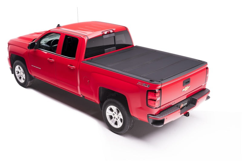 Load image into Gallery viewer, BAK 14-18 Chevy Silverado 1500 / 15-20 Silverado 2500/3500 5ft 8in Bed BAKFlip MX4 Matte Finish
