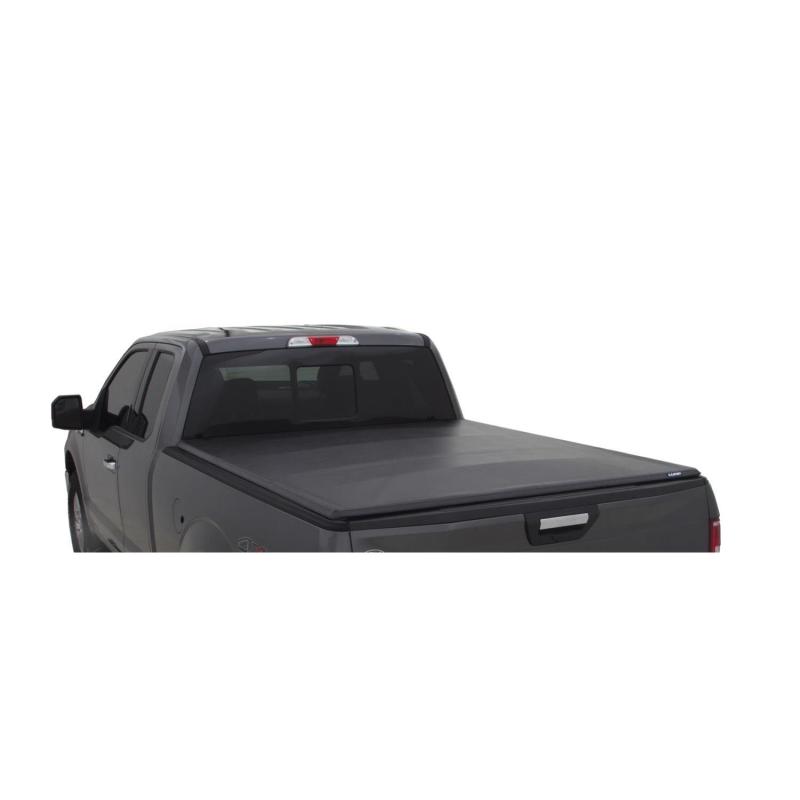 Load image into Gallery viewer, Lund 15-18 Ford F-150 (5.5ft. Bed) Genesis Tri-Fold Tonneau Cover - Black
