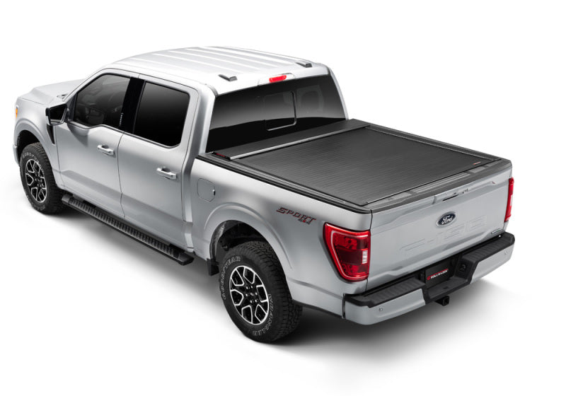 Load image into Gallery viewer, Roll-N-Lock 15-17 Ford F-150 77-3/8in E-Series Retractable Tonneau Cover
