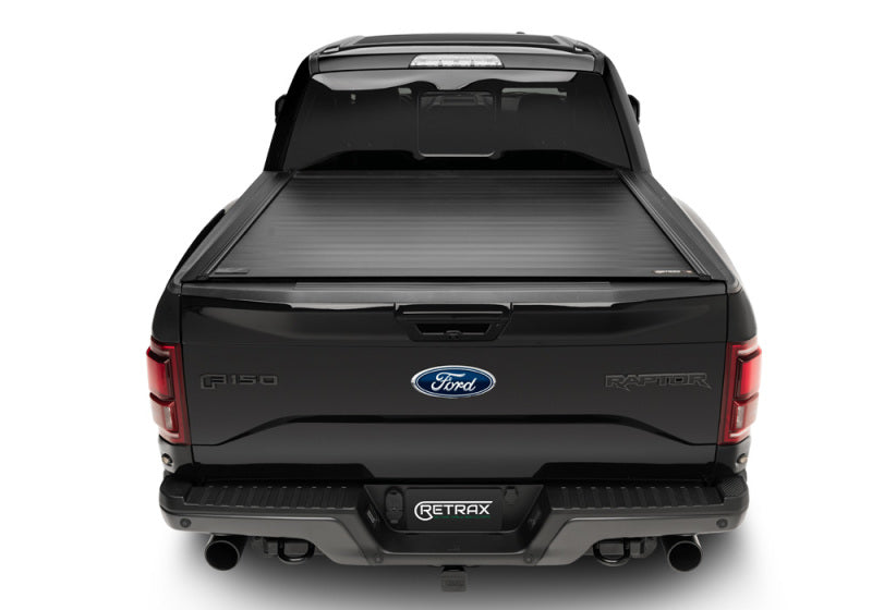 Load image into Gallery viewer, Retrax 2022+ Toyota Tundra Regular &amp; Double Cab 6.5ft Bed w/ Deck Rail System PowertraxPRO MX
