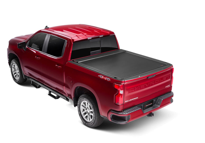 Load image into Gallery viewer, Roll-N-Lock 15-17 Chevy Silverado/Sierra 2500/3500 77-3/8in E-Series Retractable Tonneau Cover
