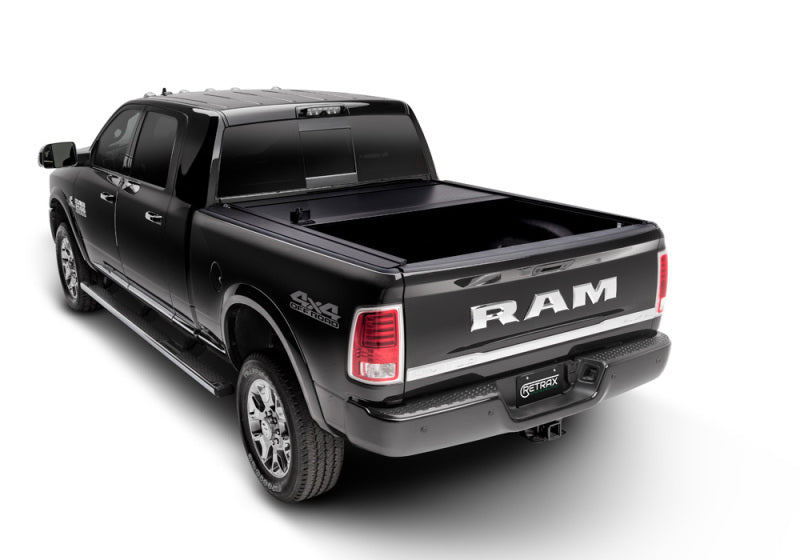 Load image into Gallery viewer, Retrax 09-up Ram 1500 5.7ft Bed-Not RamBox Option RetraxONE MX
