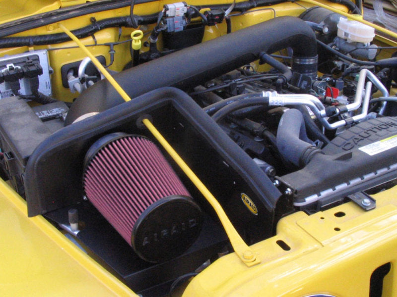 Load image into Gallery viewer, Airaid 97-06 Jeep Wrangler TJ 4.0L CAD Intake System w/ Tube (Dry / Red Media)
