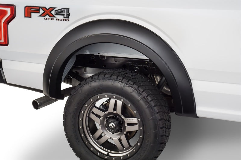 Load image into Gallery viewer, Bushwacker 15-17 Ford F-150 Styleside Extend-A-Fender Style Flares 4pc 67.1/78.9/97.6in Bed - Black
