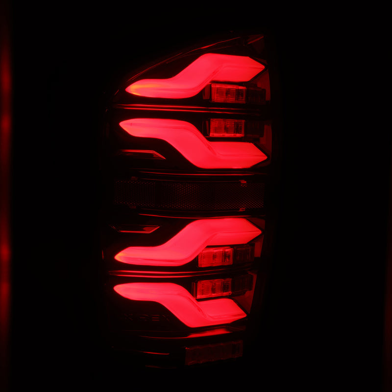 Load image into Gallery viewer, AlphaRex 16-21 Toyota Tacoma LUXX LED Taillights Blk/Red w/Activ Light/Seq Signal
