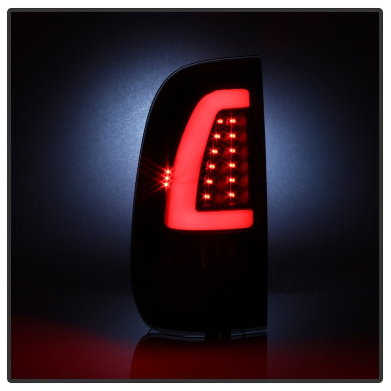 Load image into Gallery viewer, xTune 97-03 Ford F-150 Light Bar LED Tail Lights - Black Smoke (ALT-ON-FF15097-LBLED-BSM)
