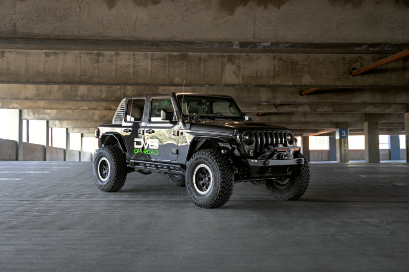 Load image into Gallery viewer, DV8 Offroad 07-23 Jeep Wrangler/Gladiator JT/JK/JL FS-25 Stubby Front Bumper w/Plated Bull Bar
