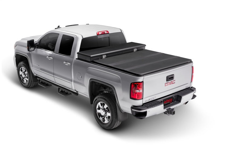 Load image into Gallery viewer, Extang 17-23 Ford F-250/F-350 Super Duty Short Bed (6ft 10in) Solid Fold 2.0 Toolbox
