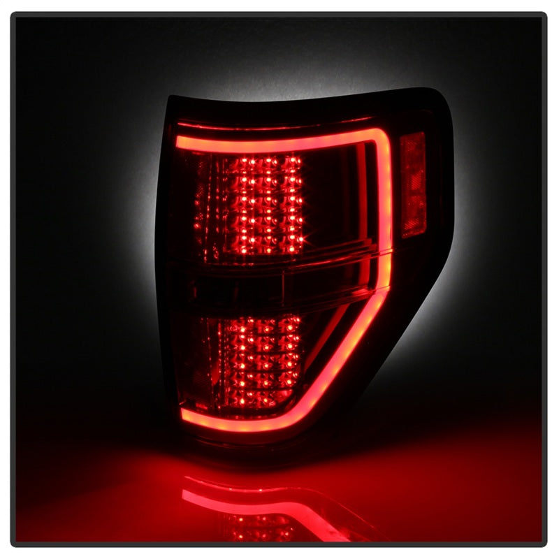 Load image into Gallery viewer, xTune 09-14 Ford F-150 Light Bar LED Tail Lights - Red Clear (ALT-JH-FF15009-LBLED-RC)

