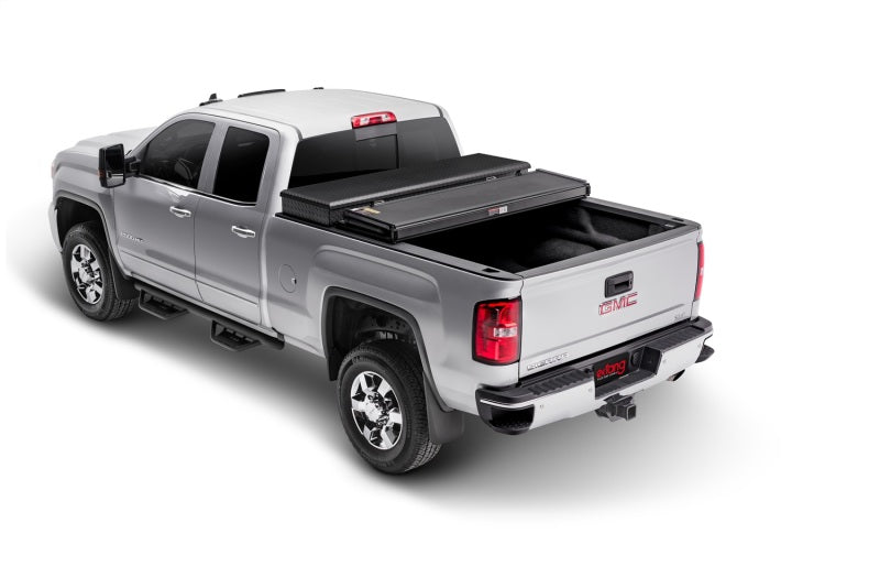 Load image into Gallery viewer, Extang 99-06 Chevy/GMC Silv/Sierra (8ft) / 07 Classic (incl HD) Solid Fold 2.0 Toolbox
