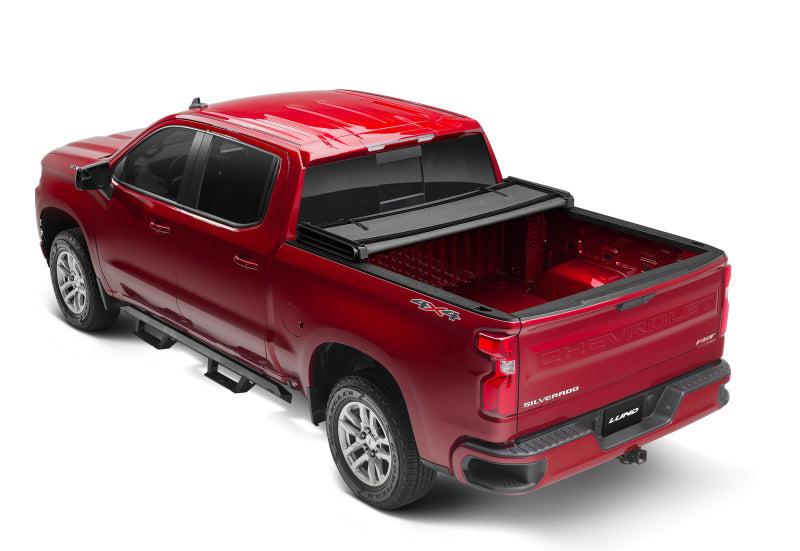 Load image into Gallery viewer, Lund 14-17 Chevy Silverado 1500 (6.5ft. Bed) Genesis Elite Tri-Fold Tonneau Cover - Black
