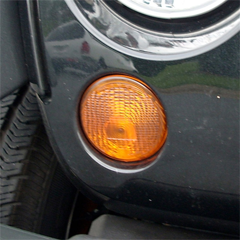 Load image into Gallery viewer, Omix Park Lamp Right Amber 07-13 Jeep Wrangler
