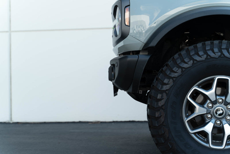 Load image into Gallery viewer, DV8 Offroad 21-23 Ford Bronco Capable Bumper Front License Plate Mount
