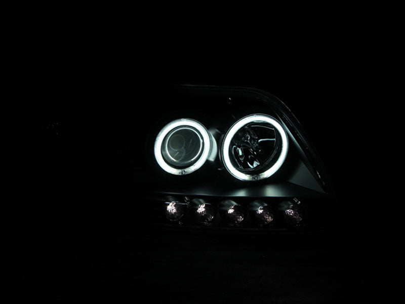 Load image into Gallery viewer, ANZO 1997-2003 Ford F-150 Projector Headlights w/ Halo Black (CCFL)
