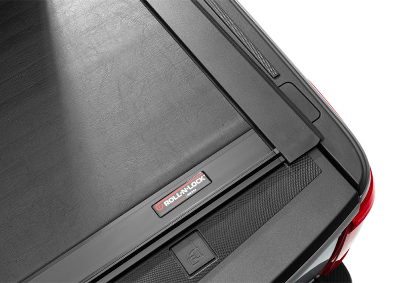 Load image into Gallery viewer, Roll-N-Lock 2021 Ford F-150 67.1in M-Series Retractable Tonneau Cover
