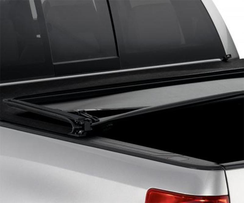 Load image into Gallery viewer, Lund 02-17 Dodge Ram 1500 (6.5ft. Bed Excl. Rambox) Genesis Elite Tri-Fold Tonneau Cover - Black
