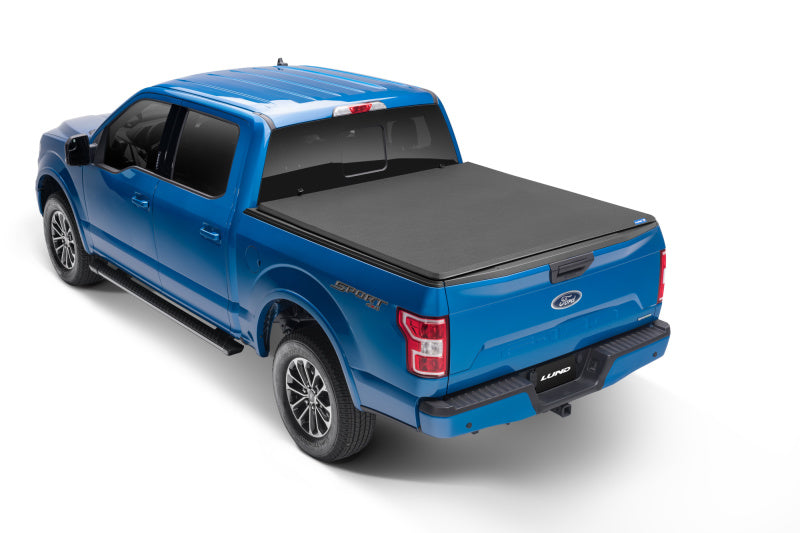 Load image into Gallery viewer, Lund 07-17 Toyota Tundra (5.5ft. Bed) Genesis Elite Tri-Fold Tonneau Cover - Black
