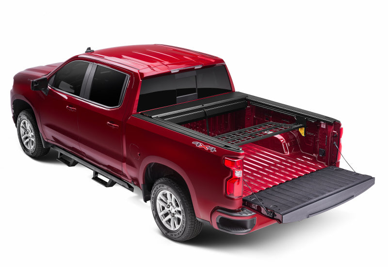 Load image into Gallery viewer, Roll-N-Lock 14-18 Chevy Silverado/Sierra 1500 SB 77-3/8in Cargo Manager
