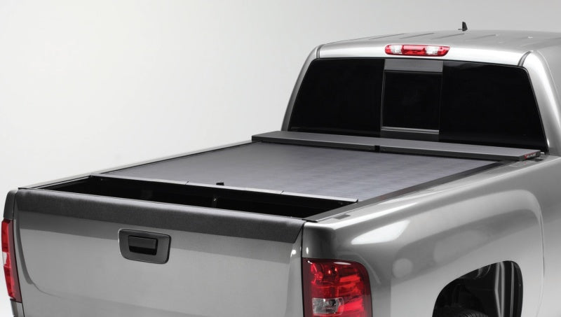 Load image into Gallery viewer, Roll-N-Lock 2020 Chevy Silverado / GMC Sierra 2500-3500 80-1/2in M-Series Retractable Tonneau Cover
