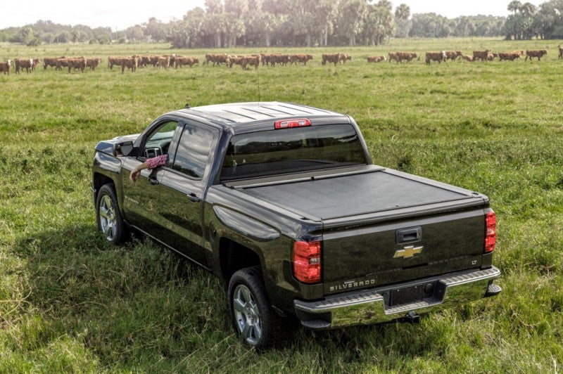 Load image into Gallery viewer, Roll-N-Lock 07-18 Toyota Tundra Crew Max Cab XSB 65in M-Series Retractable Tonneau Cover
