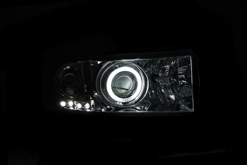 Load image into Gallery viewer, ANZO 1994-2001 Dodge Ram Projector Headlights w/ Halo Chrome
