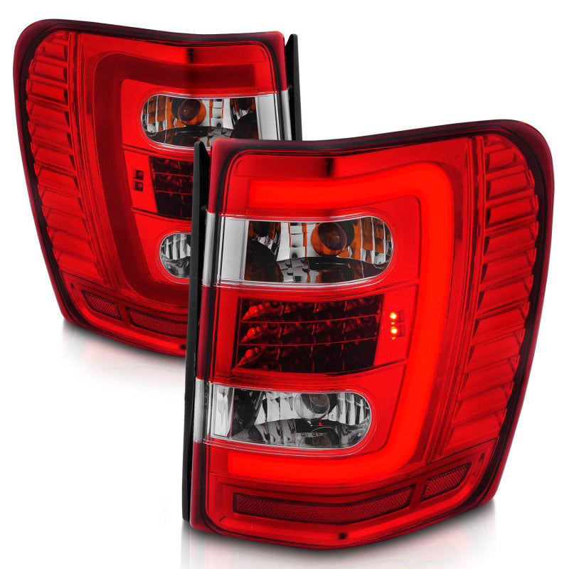 Load image into Gallery viewer, ANZO 1999-2004 Jeep Grand Cherokee LED Tail Lights w/ Light Bar Chrome Housing Red/Clear Lens
