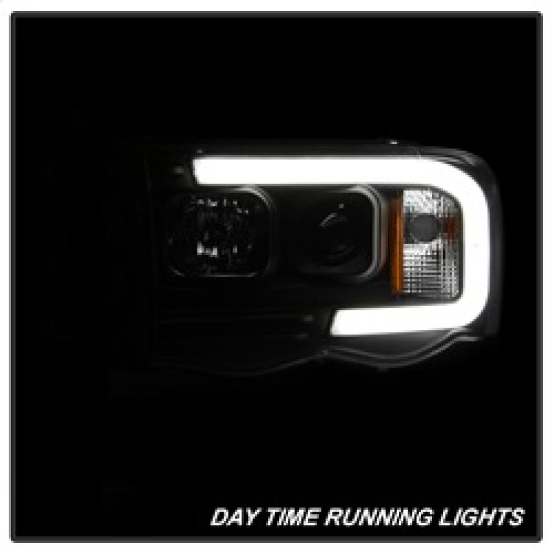 Load image into Gallery viewer, Spyder 02-05 Dodge Ram 1500 Light Bar Projector Headlights - Black (PRO-YD-DR02V2-LB-BK)
