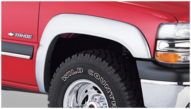 Load image into Gallery viewer, Bushwacker 00-06 Chevy Tahoe Extend-A-Fender Style Flares 4pc 4-Door - Black
