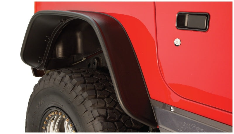 Load image into Gallery viewer, Bushwacker 97-06 Jeep Wrangler Flat Style Flares 4pc - Black
