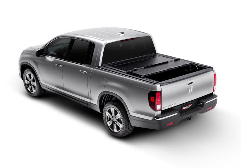 Load image into Gallery viewer, UnderCover 12-17 Isuzu Dmax 5ft Flex Bed Cover
