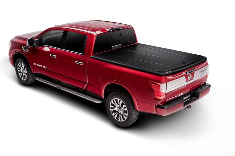 Load image into Gallery viewer, UnderCover 16-20 Nissan Titan 5.5ft SE Bed Cover - Black Textured
