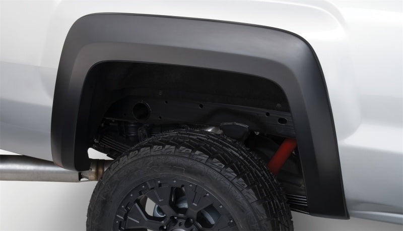 Load image into Gallery viewer, Bushwacker 15-18 GMC Sierra 2500 HD Extend-A-Fender Style Flares 4pc 78.8/97.6in Bed - Black
