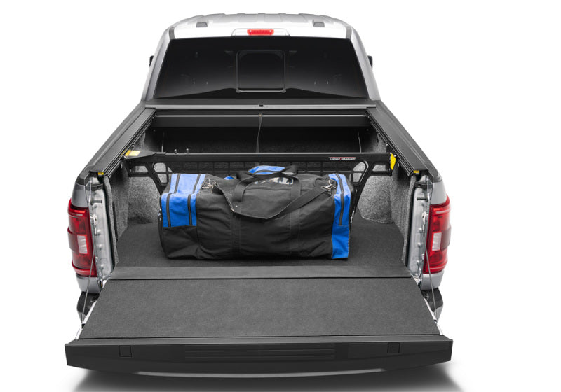 Load image into Gallery viewer, Roll-N-Lock 21-22 Ford F-150 (97.6in. Bed Length) Cargo Manager

