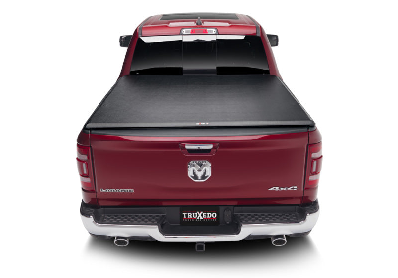 Load image into Gallery viewer, Truxedo 19-20 Ram 1500 (New Body) w/RamBox 5ft 7in TruXport Bed Cover
