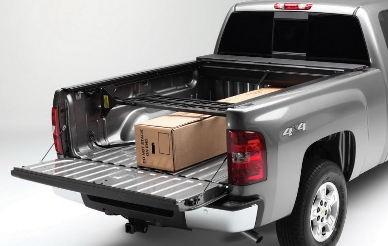 Load image into Gallery viewer, Roll-N-Lock 99-07 Chevy Silverado/Sierra w/ OE Rail Caps LB 96-3/4in Cargo Manager
