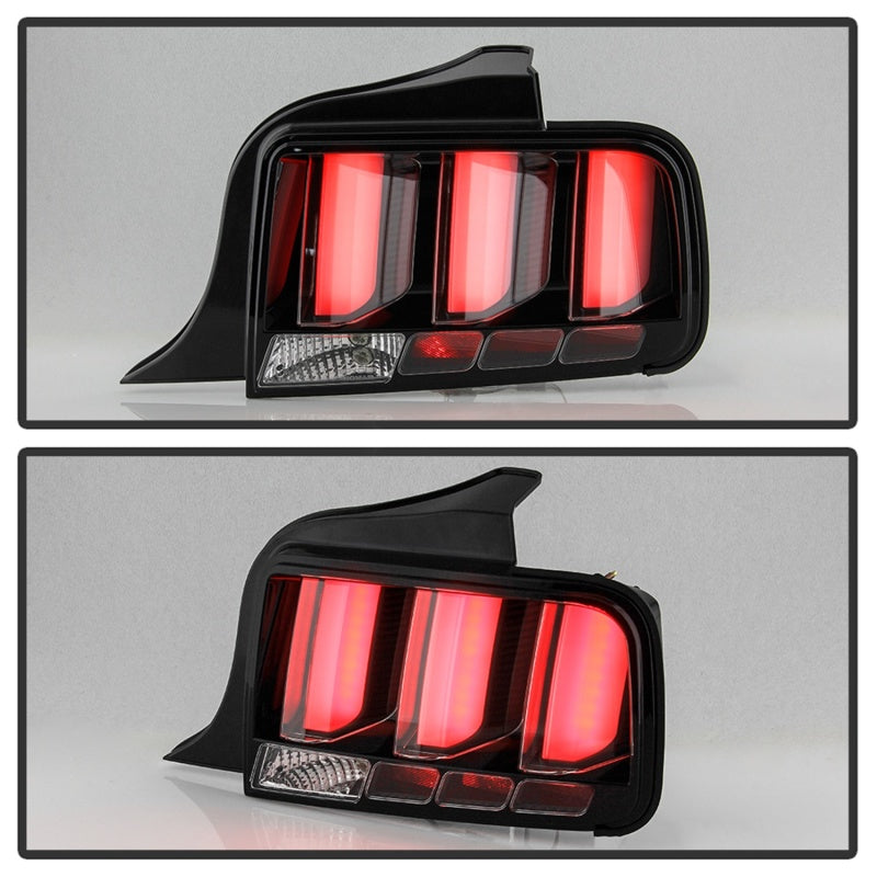 Load image into Gallery viewer, Spyder 05-09 Ford Mustang (White Light Bar) LED Tail Lights - Black ALT-YD-FM05V3-LED-BK
