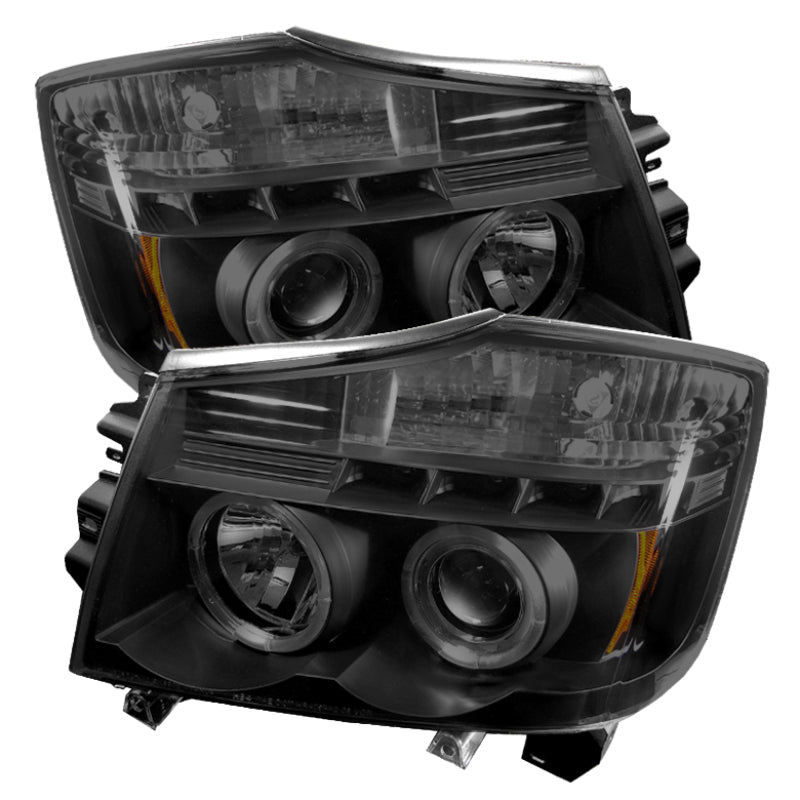 Load image into Gallery viewer, Spyder Nissan Titan 04-14 Projector Headlights LED Halo LED Blk Smke PRO-YD-NTI04-HL-BSM
