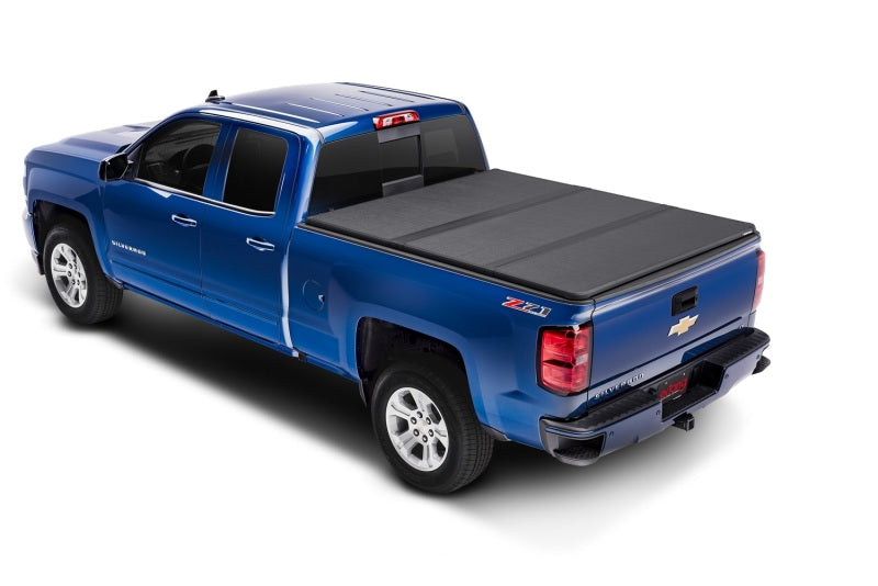 Load image into Gallery viewer, Extang 07-13 Chevy/GMC Silv/Sierra (5ft 8in) w/o Track System Solid Fold 2.0
