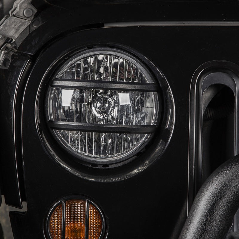 Load image into Gallery viewer, Rugged Ridge 07-18 Jeep Wrangler JK Black Elite Pivotal Headlight Euro Guard
