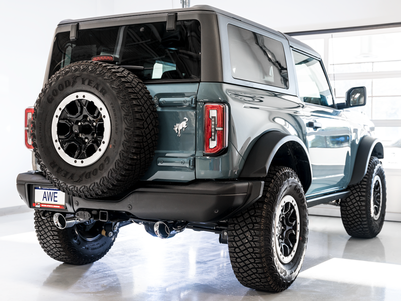 Load image into Gallery viewer, AWE Tuning 2021+ Ford Bronco 0FG Dual Rear Exit Exhaust w/Chrome Silver Tips &amp; Bash Guard
