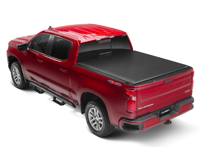 Load image into Gallery viewer, Lund 07-17 Chevy Silverado 1500 (6.5ft. Bed) Genesis Roll Up Tonneau Cover - Black
