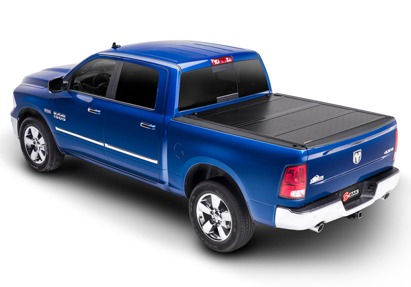 Load image into Gallery viewer, BAK 09-18 Dodge Ram 1500 (19-20 Classic Only) (w/ Ram Box) 5ft 7in Bed BAKFlip G2

