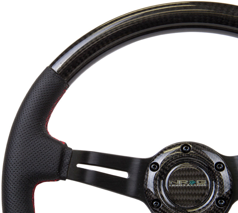 Load image into Gallery viewer, NRG Carbon Fiber Steering Wheel (350mm /1.5in. Deep) Leather Trim w/Red Stitch &amp; Slit Cutout Spokes
