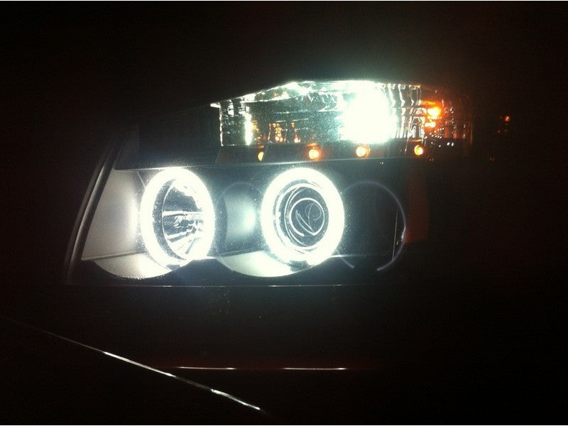 Load image into Gallery viewer, Spyder Nissan Titan 04-14/Armada 04-07 Projector Headlights CCFL Halo LED Blk PRO-YD-NTI04-CCFL-BK
