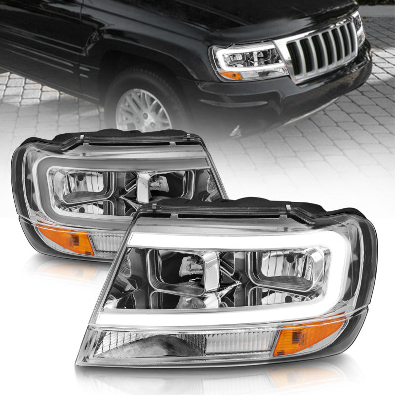 Load image into Gallery viewer, ANZO 1999-2004 Jeep Grand Cherokee Crystal Headlights w/ Light Bar Chrome Housing
