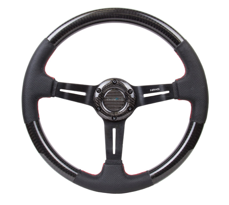 Load image into Gallery viewer, NRG Carbon Fiber Steering Wheel (350mm /1.5in. Deep) Leather Trim w/Red Stitch &amp; Slit Cutout Spokes
