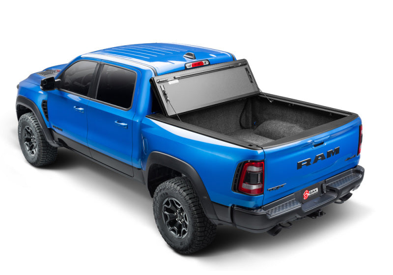 Load image into Gallery viewer, BAK 19-20 Dodge Ram 1500 (New Body Style w/ Ram Box) 5ft 7in Bed BAKFlip MX4 Matte Finish
