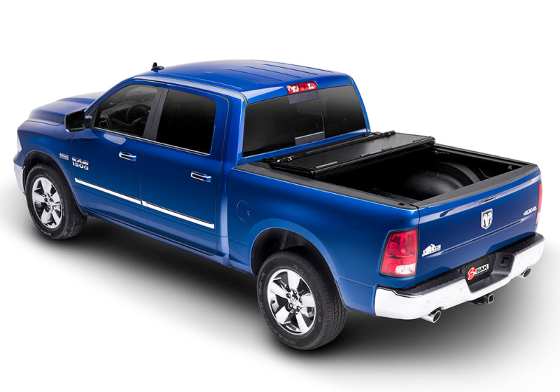 Load image into Gallery viewer, BAK 09-18 Dodge Ram 1500 (19-20 Classic Only) (w/ Ram Box) 5ft 7in Bed BAKFlip G2
