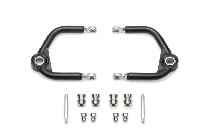 Load image into Gallery viewer, Fabtech 10-14 Ford F150 Raptor 4WD 0in/4in Uniball Upper Control Arm Kit
